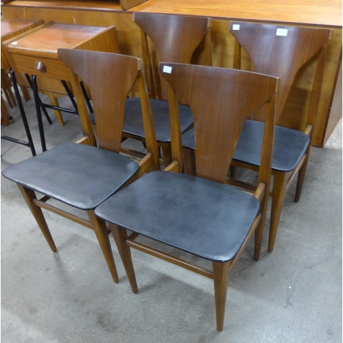 96 - A set of four teak dining chairs