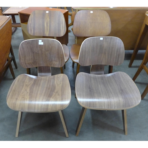 98 - Four Eames style simulated rosewood bent plywood chairs