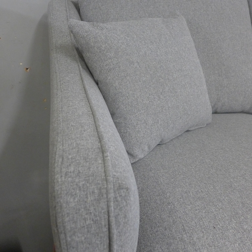 1379 - A mid grey upholstered 2.5 seater sofa