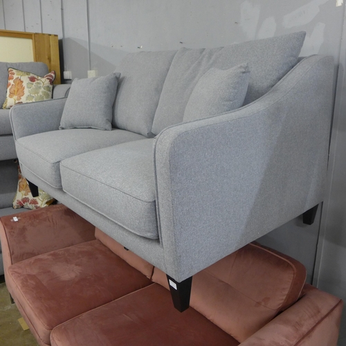 1379 - A mid grey upholstered 2.5 seater sofa