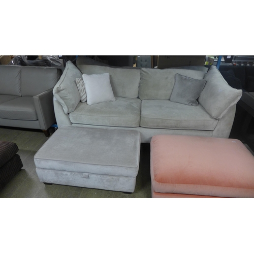 1552 - A Barker and Stonehouse grey velvet upholstered three seater sofa and footstool (sofa damaged and ma... 