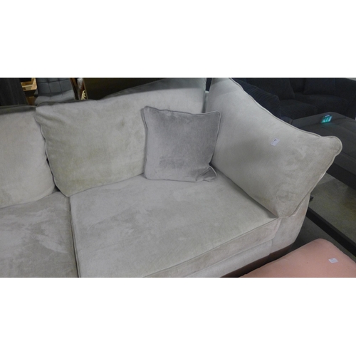 1552 - A Barker and Stonehouse grey velvet upholstered three seater sofa and footstool (sofa damaged and ma... 