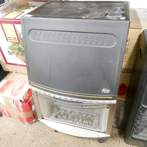 2362 - A Valor gas fire heater with a part filled Calor Gas bottle and a Superser GTI gas heater