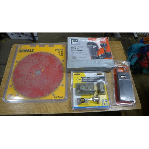 2384 - A staple gun, a Dewalt 305mm saw blade, a Yale lock and a keypad security lock