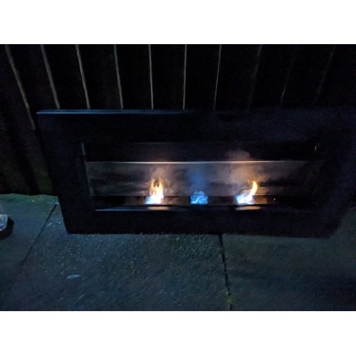 2329 - A Bio Ethanol burner wall mounting fire with bottle of fuel and flame changing chemicals