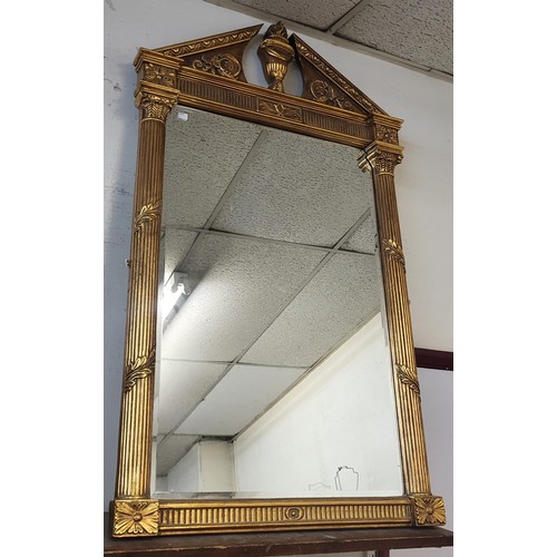 382A - A Regency style gilt framed mirror