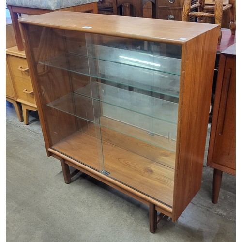 111 - A Turnidge of London teak display cabinet