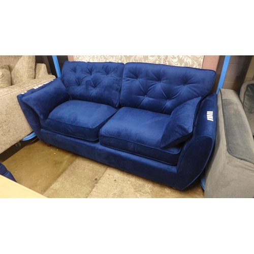 1997 - A pair of Hoxton blue velvet upholstered three seater sofas RRP £1598