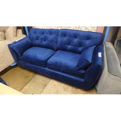 1996 - A pair of Hoxton blue velvet upholstered three seater sofas RRP £1598