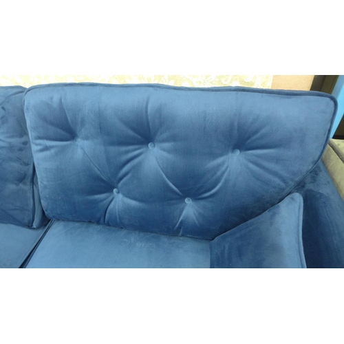 1996 - A pair of Hoxton blue velvet upholstered three seater sofas RRP £1598