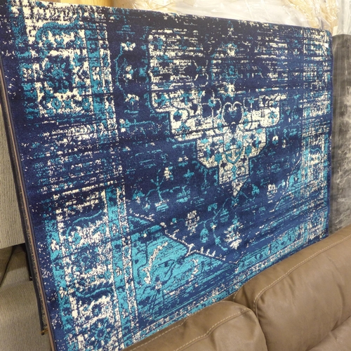 1999 - A full pile rich blue ground contemporary vintage style carpet, 200cm x 300cm