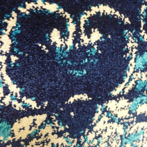 1999 - A full pile rich blue ground contemporary vintage style carpet, 200cm x 300cm