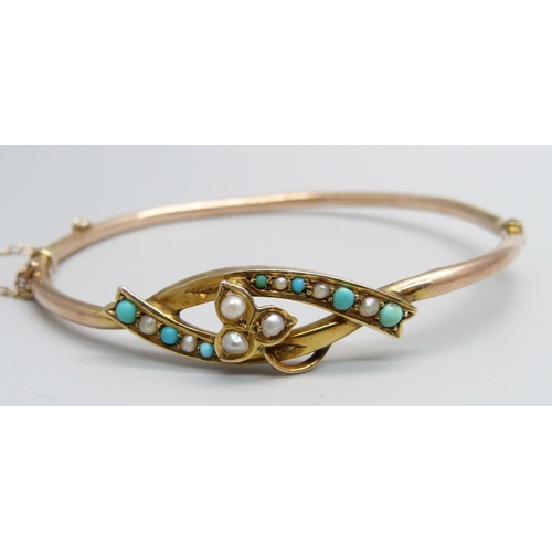 1299 - A 9ct gold, turquoise and pearl bangle, 4.7g