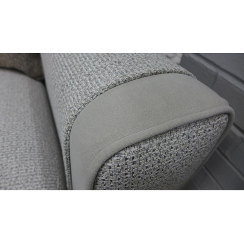 1324 - A textured weave light grey love seat