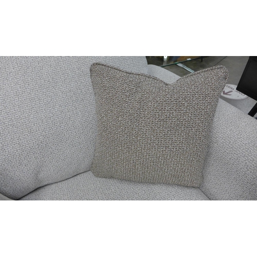 1324 - A textured weave light grey love seat