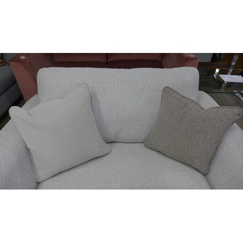 1324 - A textured weave light grey love seat