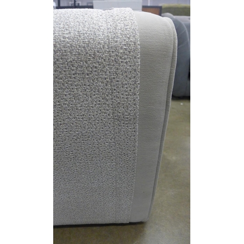 1324 - A textured weave light grey love seat