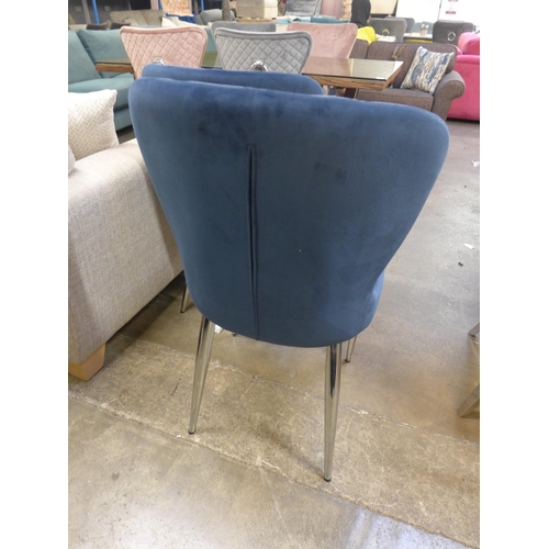 1357 - A pair of blue velvet upholstered buttoned back dining chairs * this lot is subject to VAT