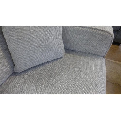 1381 - A Shada Hopsack silver three seater sofa and ottoman footstool RRP £1398