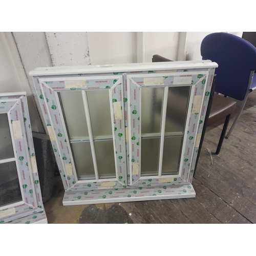 4 - Twelve UPVC window frames, various sizes, two with glass panels

Lot is offered for sale in situ at ... 