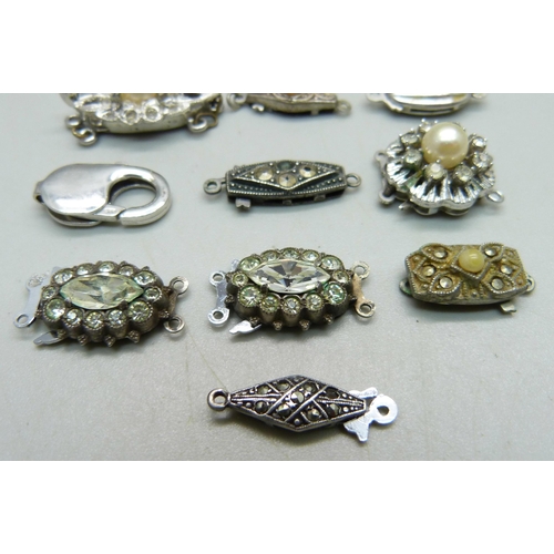 1000 - Ten silver clasps, two a/f with stones missing