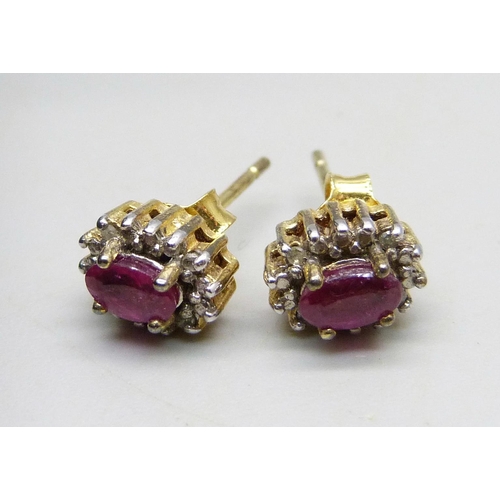 1002 - A pair of silver gilt cluster earrings set with rubies, two pairs of unmarked yellow metal earrings,... 