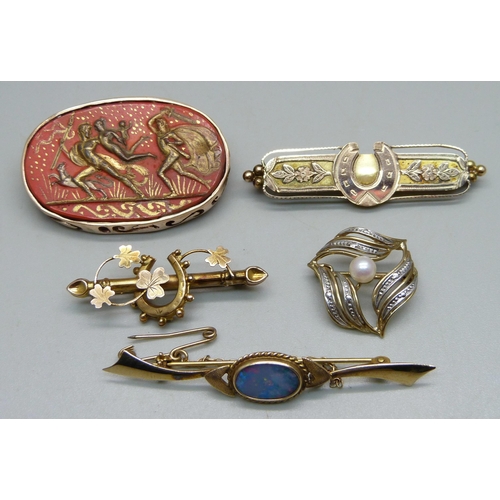 1011 - Two 9ct gold bar brooches with horseshoe designs, a 9ct gold and opal doublet set bar brooch, a 9ct ... 