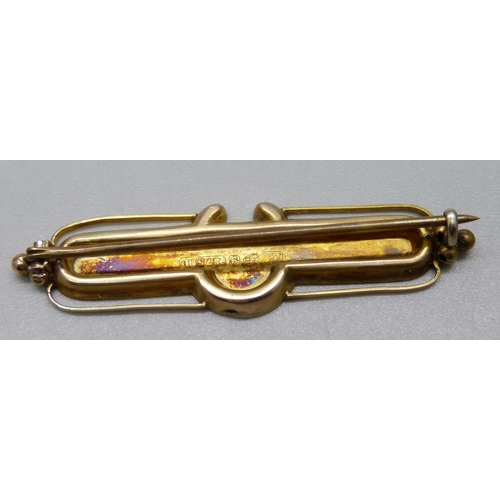 1011 - Two 9ct gold bar brooches with horseshoe designs, a 9ct gold and opal doublet set bar brooch, a 9ct ... 