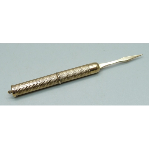 1022 - A 9ct gold tooth pick, 6.8g