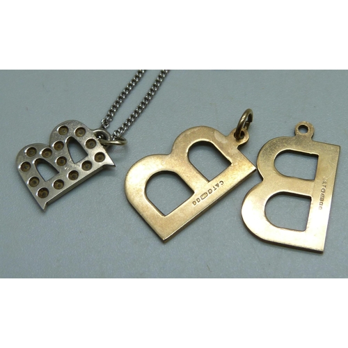 1024 - A white metal and diamond 'B' pendant on an 18ct gold chain, 5.4g and two 9ct gold 'B' pendants, 4g