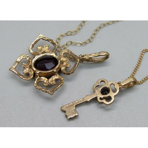 1033 - A 9ct gold pendant set with a garnet on a fine 9ct gold chain, and a 9ct gold key pendant on a 9ct g... 