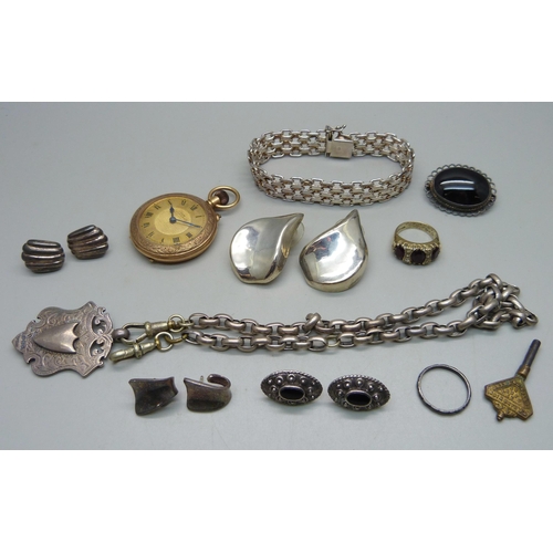 1056 - A silver fob on a white metal chain with base metal dog clips, a top-wind fob watch, four pairs of s... 