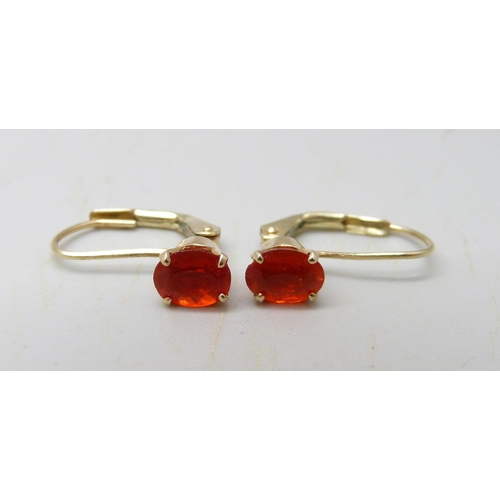 1063 - A pair of 9ct gold drop earrings set with Mexican fire opals, 1.2g