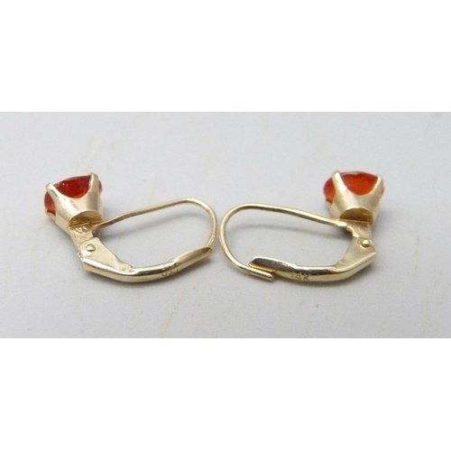 1063 - A pair of 9ct gold drop earrings set with Mexican fire opals, 1.2g