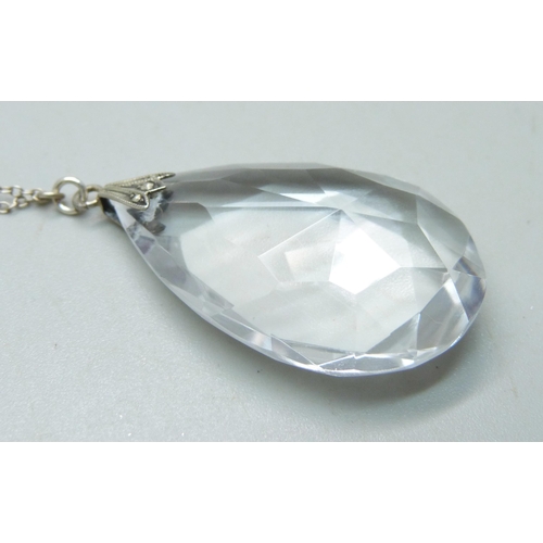 1064 - A circa 1930 rock crystal faceted teardrop pendant with fancy spacers on silver chain, 16.9g, 56cm a... 