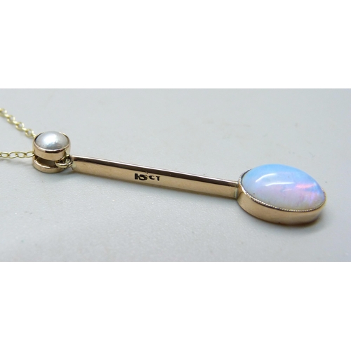 1067 - An Edwardian Australian crystal opal pendant set in 15ct yellow gold with split pearl bail on a fine... 