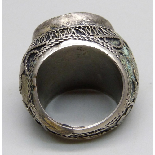 1070 - A large Islamic metal and blue stone seal ring