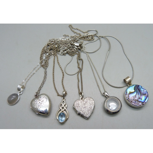 1078 - Two silver lockets and chains and four silver pendants and chains, 30g