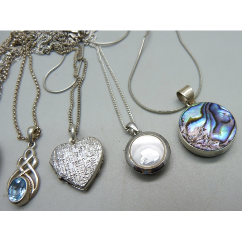 1078 - Two silver lockets and chains and four silver pendants and chains, 30g