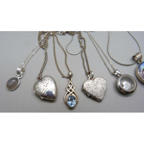 1078 - Two silver lockets and chains and four silver pendants and chains, 30g