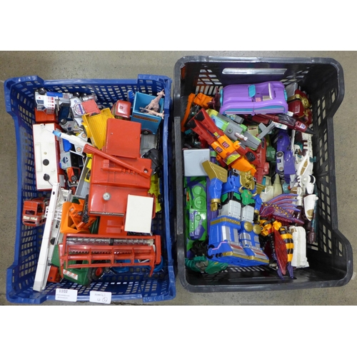 1102 - A box of mixed die-cast model vehicles, Matchbox, etc., and a box of Transformer figures **PLEASE NO... 