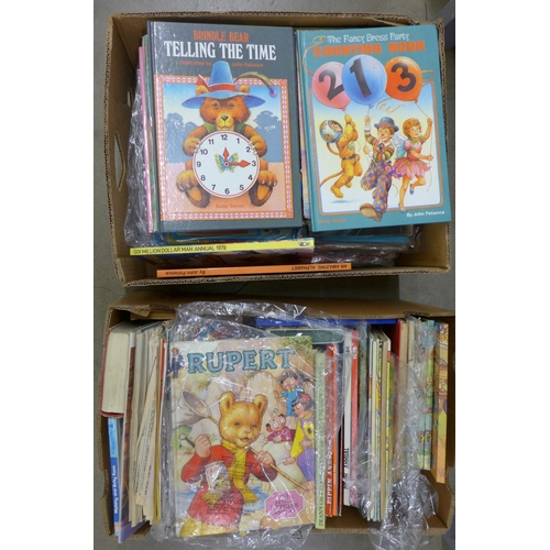 1144 - Two boxed of vintage children's annuals including Rupert The Bear, Pippin, Adam Adamant, Enid Blyton... 