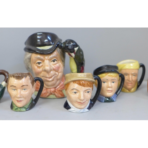 611 - Thirteen Royal Doulton miniature Toby jugs and one small Toby jug