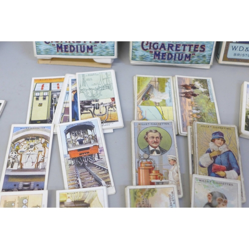 616 - Cigarette card collections in five John Player cigarette boxes