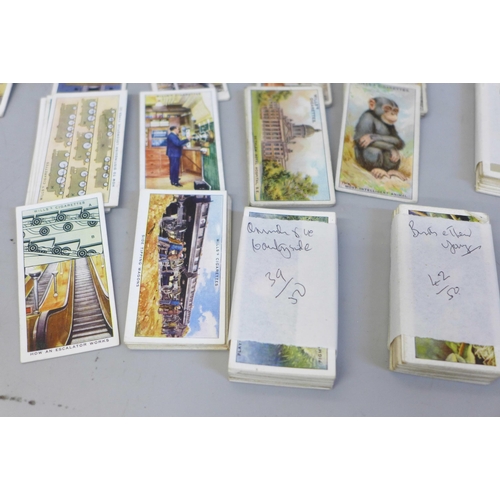 616 - Cigarette card collections in five John Player cigarette boxes