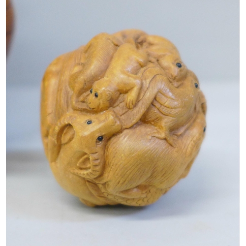 618 - A Chinese carved zodiac ball netsuke, Japanese three section hand painted box, a carved letter stamp... 