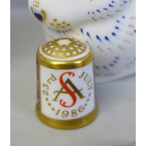 631 - Three Royal Crown Derby paperweights, two with gold stoppers, a thimble and an Imari cake server