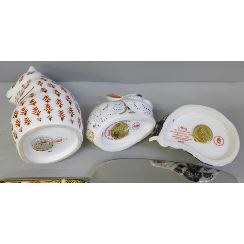 631 - Three Royal Crown Derby paperweights, two with gold stoppers, a thimble and an Imari cake server