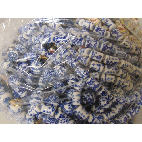 652 - Twenty-three Chinese style porcelain bead necklaces