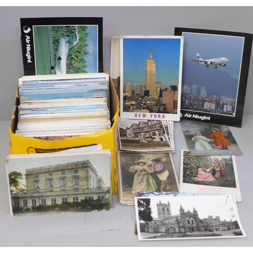 689 - Postcards; a box of postcards, vintage to modern